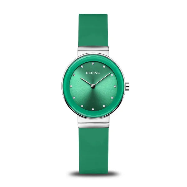 The Bering Watch - Classic Collection - 10129-808 features a green strap, matching dial, silver markers, Bering at the top, and a minimalist stainless steel case for a stylish look.
