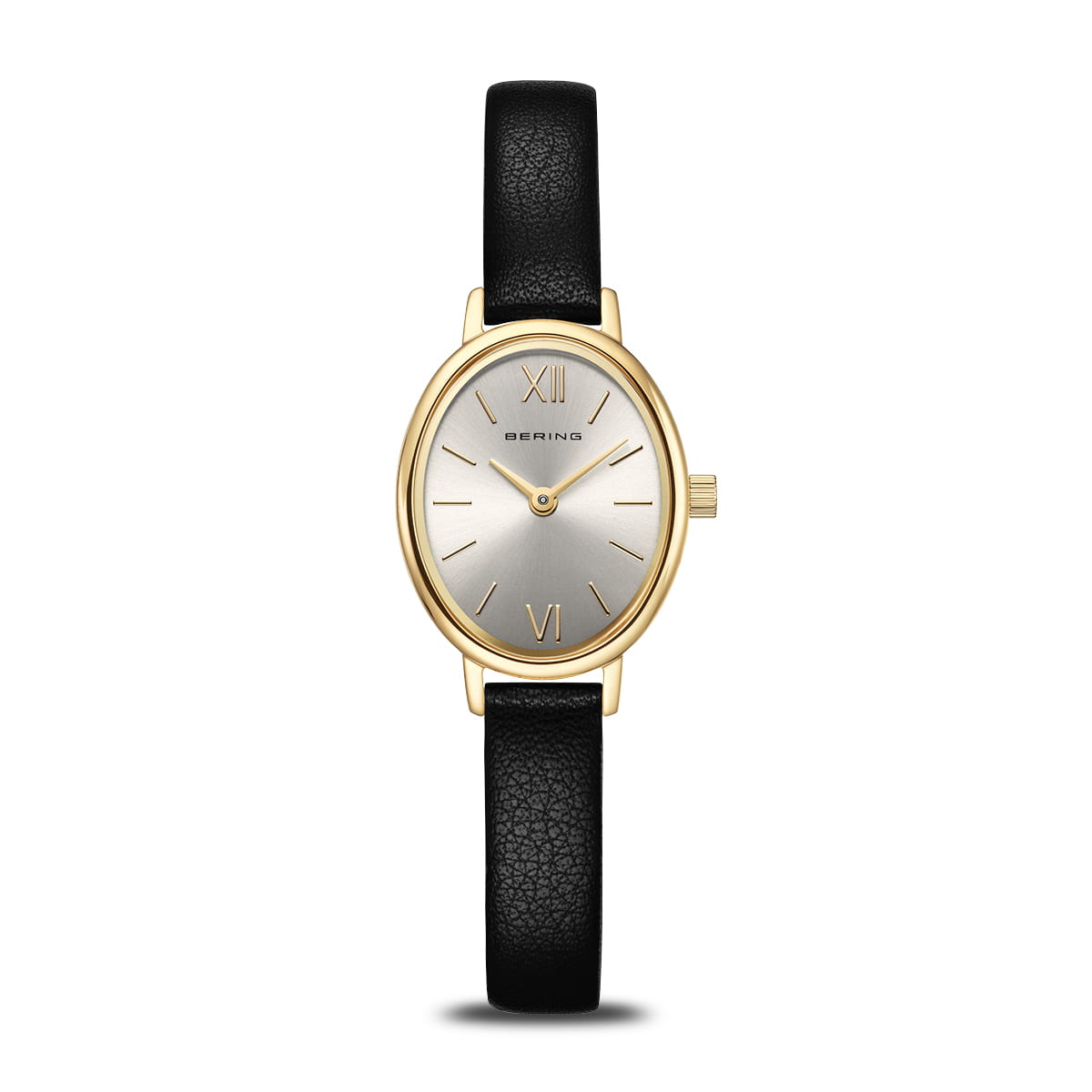The Bering Watch - Classic Collection - 111020-433 by Bering features a gold oval case, a sleek silver dial accented with refined Roman numerals at 12 and 6 o’clock, slender gold hands, and a sophisticated black leather strap for a timelessly elegant look.