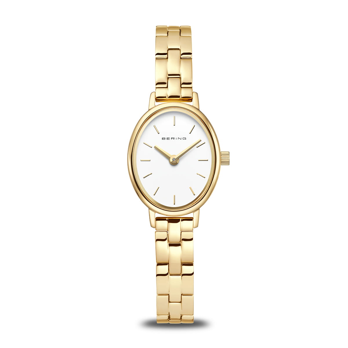 The Bering Watch - Classic Collection 11020-734 features a gold-tone slim linked bracelet, oval white dial, minimal gold markers, and two hands. This elegant women's watch displays the Bering brand on the dial.