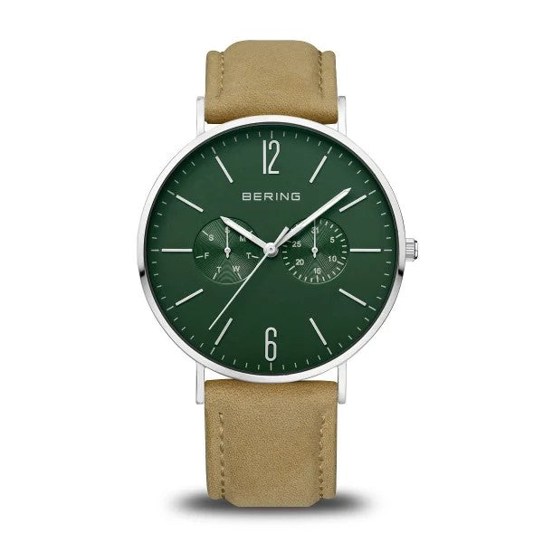 The Bering Classic Collection Mens Green Watch (14240-608) features a green dial, silver hour markers, subdials, white hands set at 10:10, a stainless steel case, and a tan leather strap in minimalist Danish design.