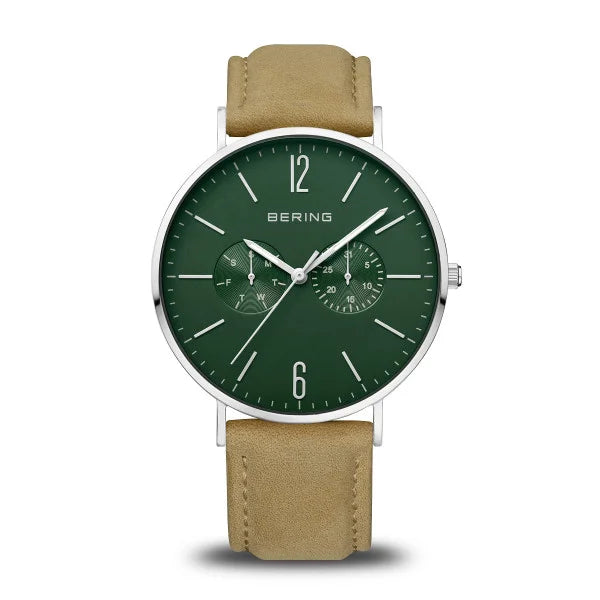 The Bering Watch - Classic Green Sunray - 14240-508 by Bering is displayed against a plain white background, highlighting its eye-catching green sunray dial, sleek silver case, minimalist white hour markers, two subdials, and a tan leather strap.