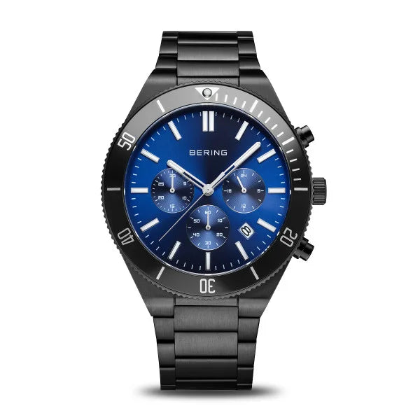 The Bering Watch - Classic Collection 15043-727 features a black stainless steel strap, blue dial, white hour markers, three subdials, date window, BERING branding at the top, and a minute-marked bezel in a refined chronograph design.