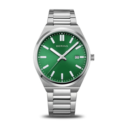 The Bering Watch - Classic Collection - 17639-708 features a green dial with white hour markers, silver hands, a date window at 3 o’clock, and the Bering logo on the face in a sleek silver stainless steel design.