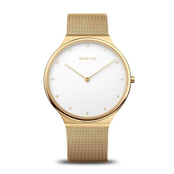 The Bering Watch - Ultra Slim Women's Gold (18440-334) features a minimalist gold design with a white face, slim gold hands, mesh band, and simple hour markers—showcasing the timeless elegance of Danish brand Bering.