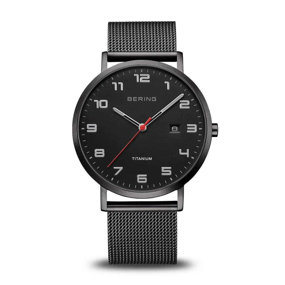 The Bering Watch - Titanium Collection - 18640-122 features a black titanium case, round face, silver hour markers and hands, red second hand, date at 3 o’clock, sapphire crystal, and a black Milanese mesh bracelet with “TITANIUM” above 6 o’clock.