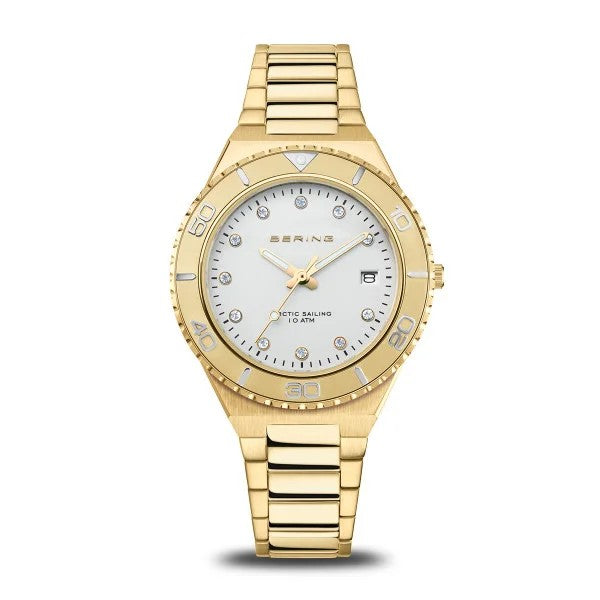 The Bering Watch - Arctic Sailing Collection Womens Gold (18936-734) features a white face, gold hour markers, date window at 3 o’clock, and a gold link band—elegantly showcased against a white background.