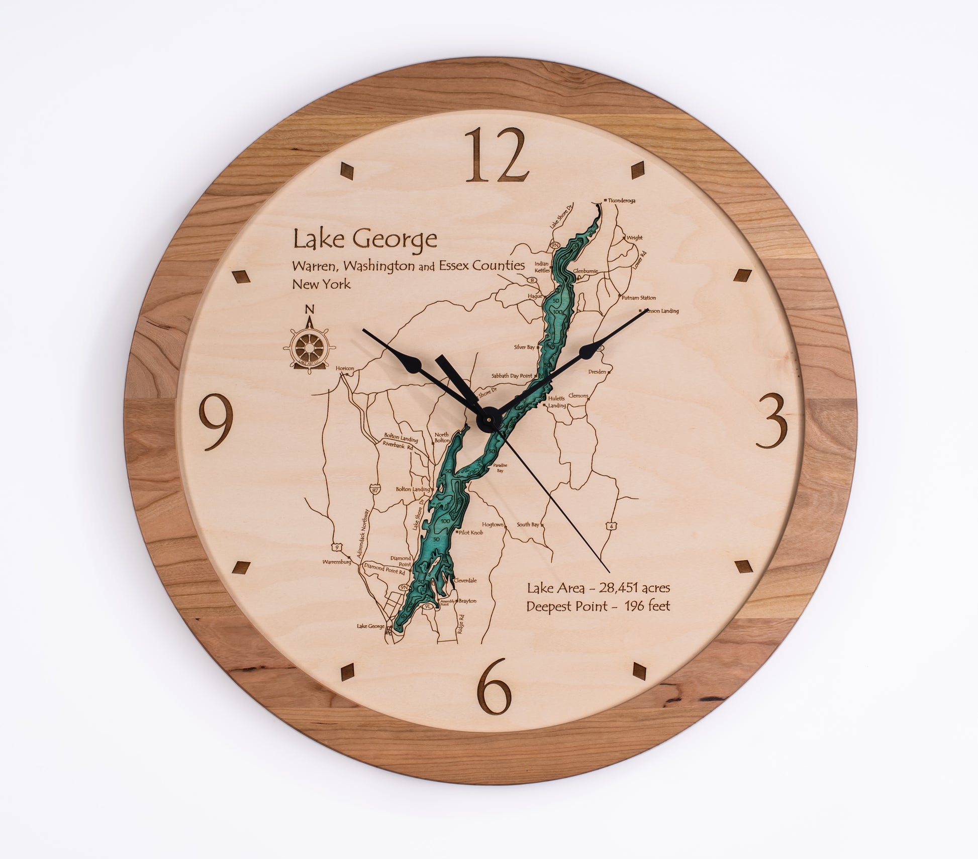 The Lake Art Lake Clock - Lake George is a round wooden clock featuring a carved, painted map of Lake George, NY with county labels and lake stats—perfect as Adirondacks decor or a unique custom gift.
