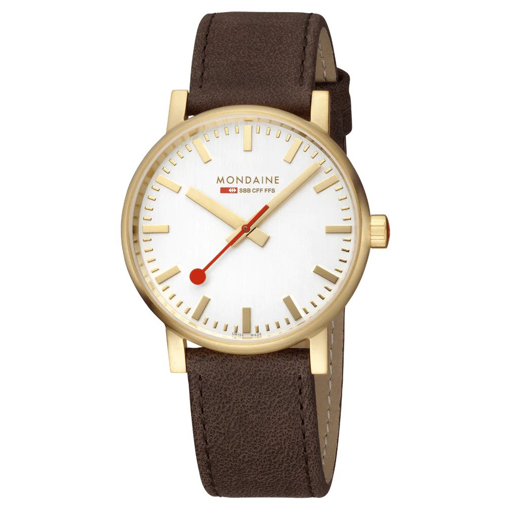 The Swiss-made Mondaine Evo2 (MSE.40112.LG) watch features a gold-tone round case, white dial with gold markers and hands, signature red second hand, brown leather strap, and displays the Mondaine name and logo on the face.