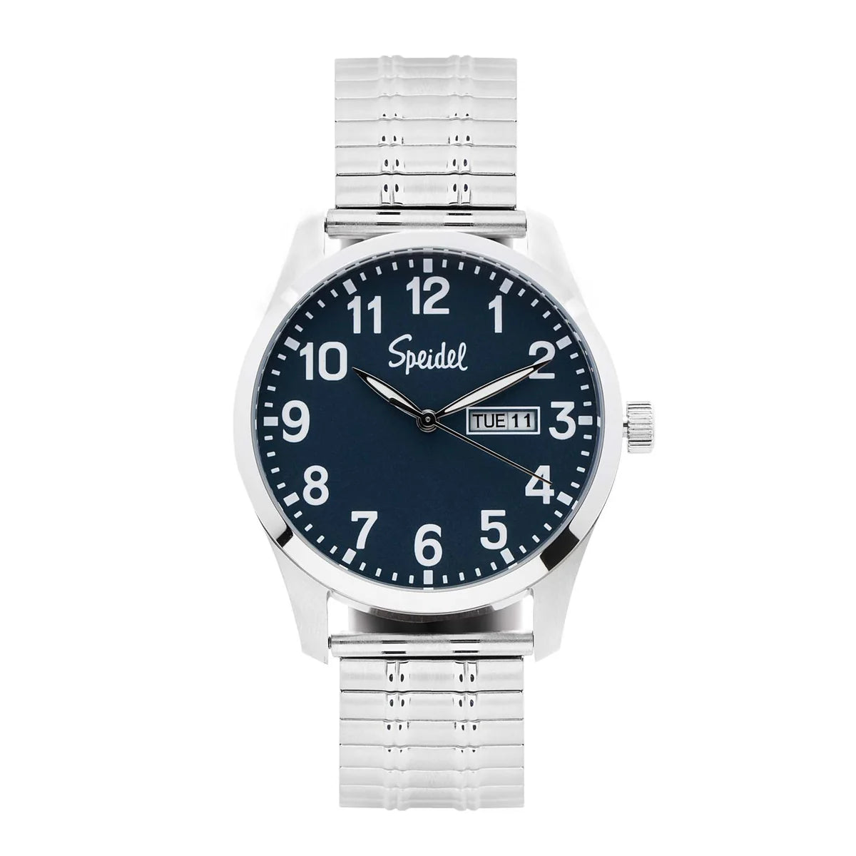 The Speidel Watch - Essentials - 603392001 by Speidel features a silver case, blue face, white numbers, classic Twist-O-Flex band, and displays day and date in a window on the right side of the dial.