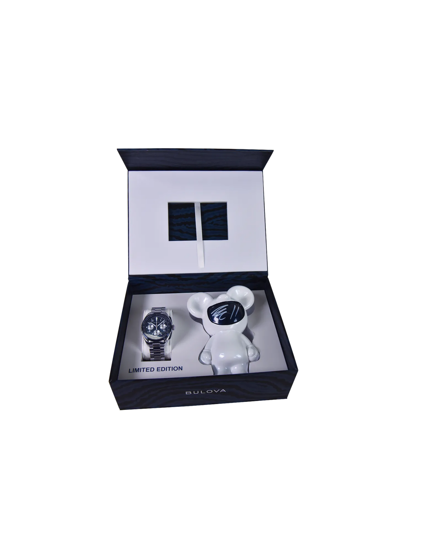 The Bulova Lunar Pilot Timascus 98A329 limited-edition chronograph gift set includes a wristwatch and a white bear figurine, both showcased in an open box with “LIMITED EDITION” displayed inside.