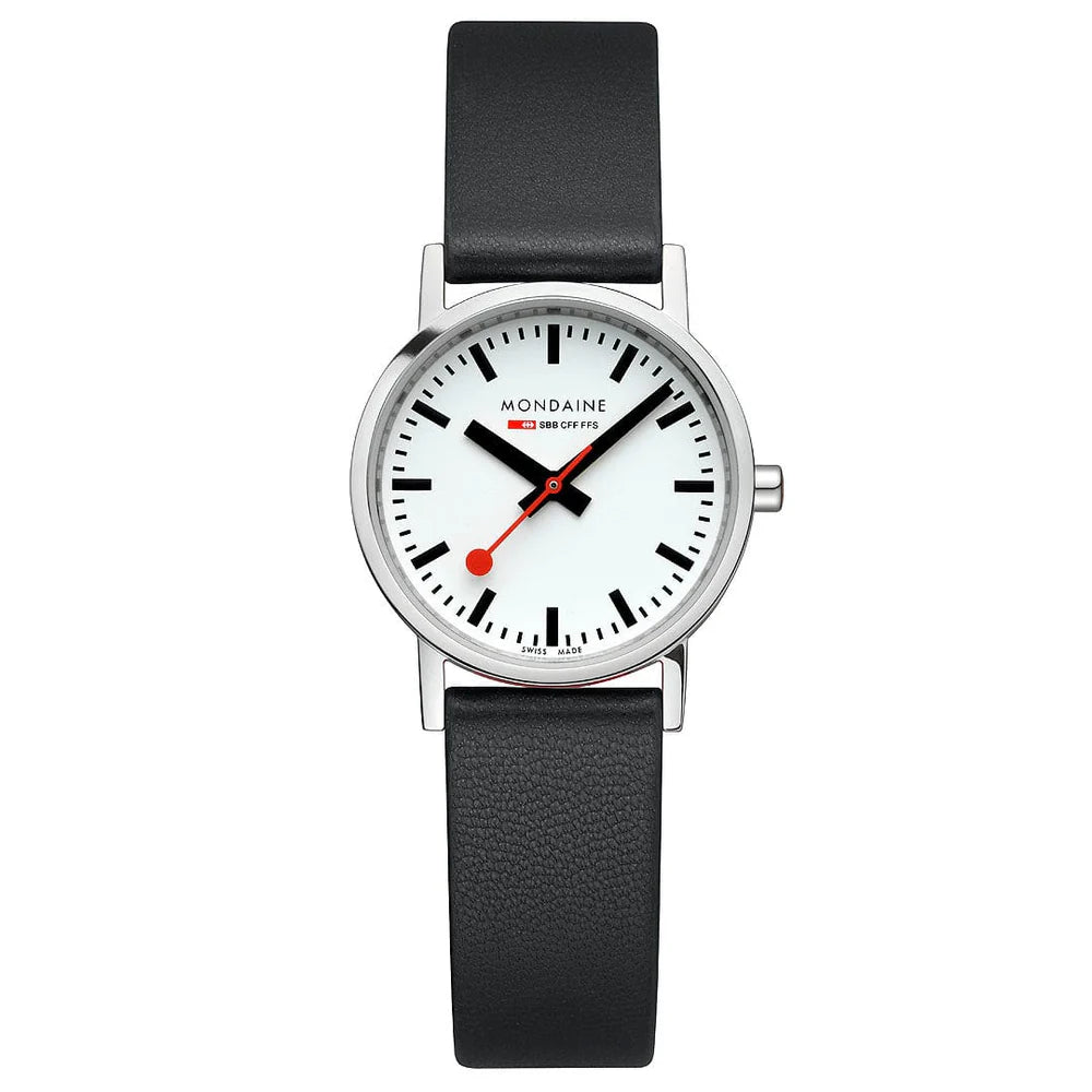The Mondaine Watch - Classic Black Vegan (A658.30323.11SBBV) features a white face, black hour and minute hands, red second hand, black hour markers, and a minimalist design with a sustainable vegan grape leather strap.