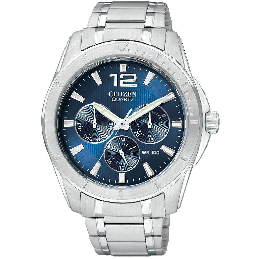 The Citizen Quartz AG8300-52L men's watch features a stainless steel case, blue dial, silver hour markers, multiple subdials, metal link band, a bold 12 at the top, and "Citizen Quartz" below.