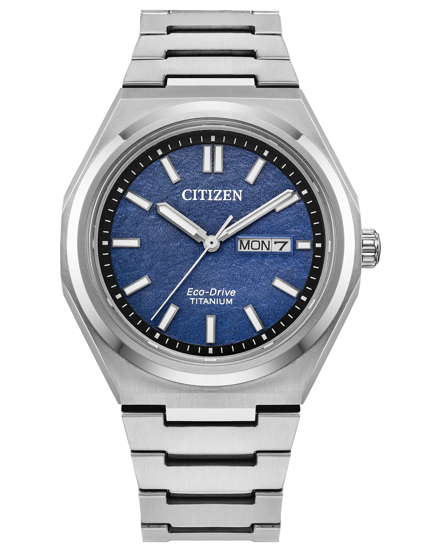 The Citizen Zenshin Super Titanium AW0130-85L features Eco-Drive, a silver band, blue textured dial, white markers and hands, and a day-date display at 3 o’clock.