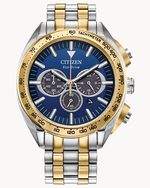 The Citizen Carson (CA4544-53L) men's Eco-Drive watch features a blue dial, silver and gold two-tone stainless steel band, gold tachymeter bezel, three sub-dials, and elegant silver-and-gold accents.