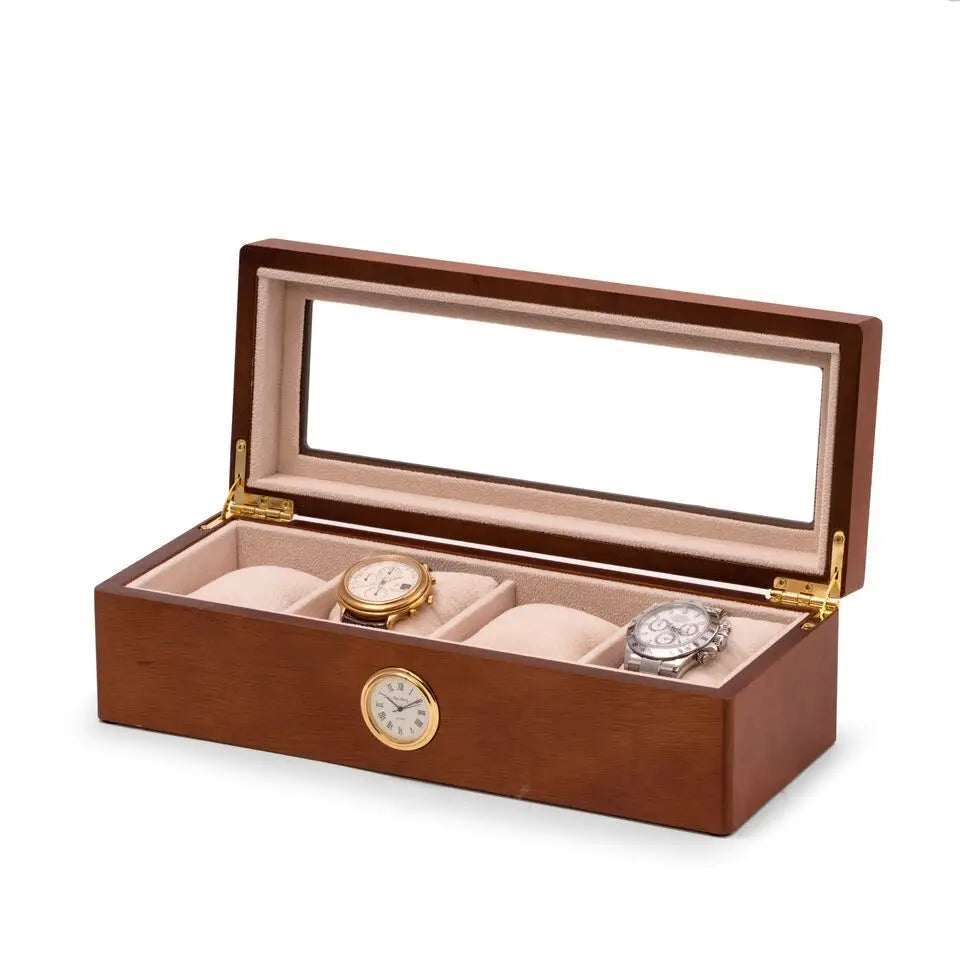 The Bey-berk CM659BRW is a brown cherry wood watch box with a glass lid, beige interior, and four compartments for watches. A small round quartz clock is set into the front of the box.