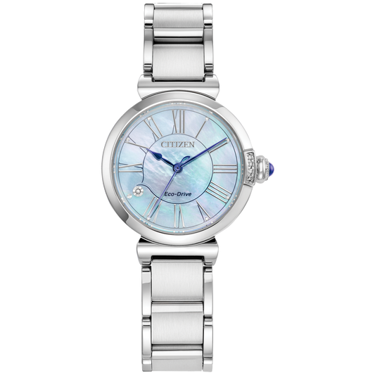 The Citizen Watch - Citizen L Mae (EM1060-52N) is a silver women’s timepiece by Citizen, featuring a light blue iridescent face with Roman numerals, a crystal at 8 o’clock, and an elegant silver bracelet band for sustainable luxury.