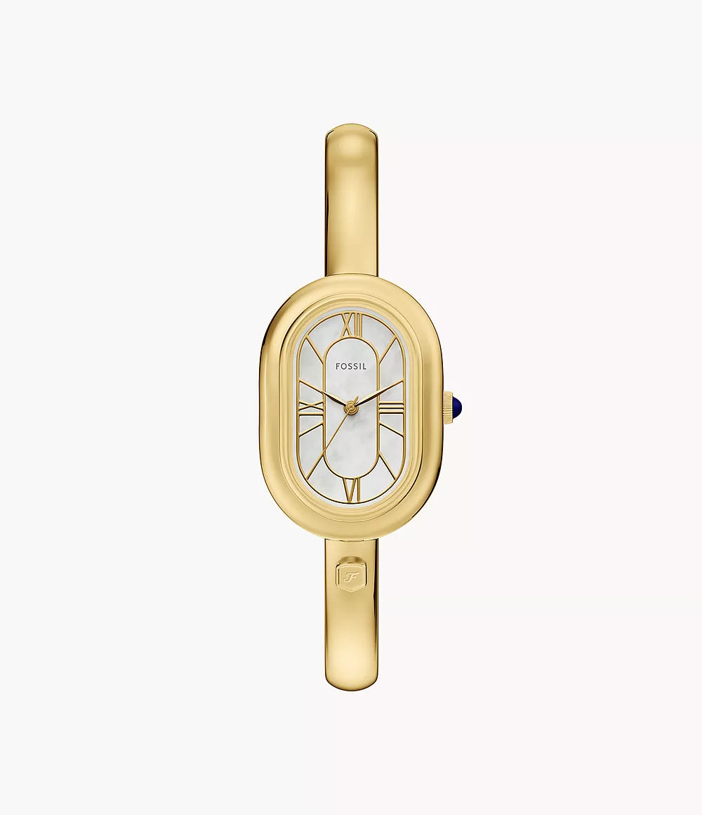 The Fossil Sloan ES5444 is a gold bangle watch with an oval face, mother-of-pearl dial, minimalist gold markers and hands, slim gold band, and a unique blue crown.