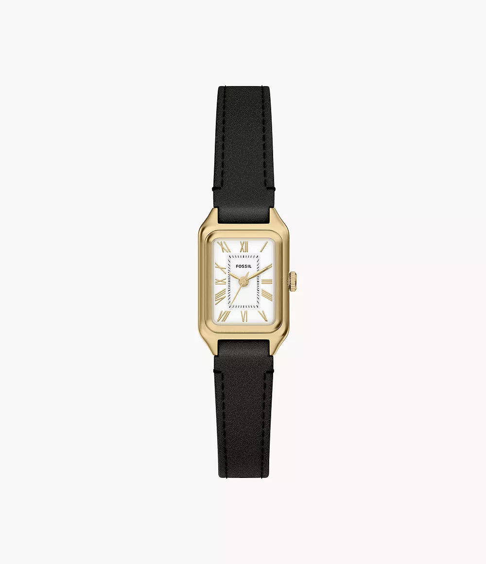 The Fossil Raquel ES5470 Watch showcases a gold-tone rectangular case, white dial with black Roman numerals, and a classic black leather strap—blending minimalist design with timeless elegance.