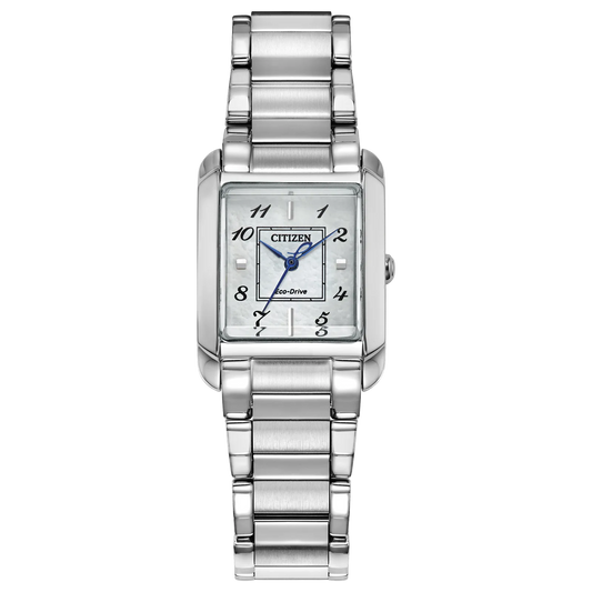 The Citizen L Bianca Ladies Eco-Drive (EW5600-52D) is a silver watch with a square face, silver band, black Arabic numerals, and blue hands—an elegant and sustainable luxury by Citizen.