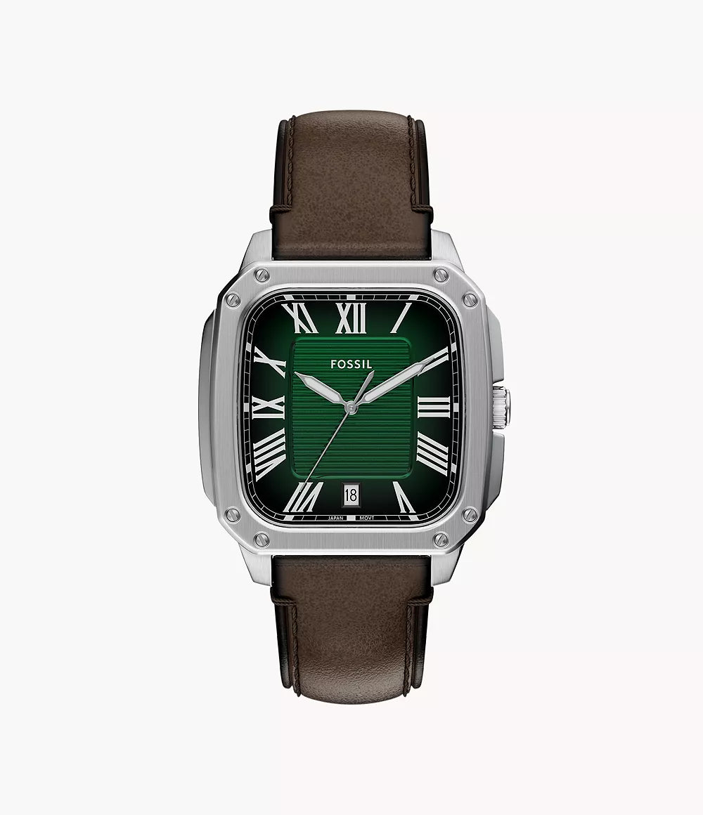 The Fossil Watch - Crosby - FS6150 features a square silver case, green dial with white Roman numerals, date window at 6 o'clock, and a brown leather strap for a stylish, refined look.