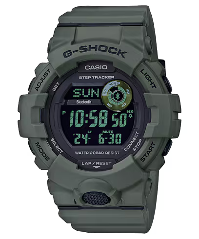 The VLC Distribution Co. Casio G-Shock Watch - MOVE Series GBD800UC-3 in military green has a large round face with time, date, Bluetooth, step tracker, and bezel buttons—ideal as a durable fitness watch.