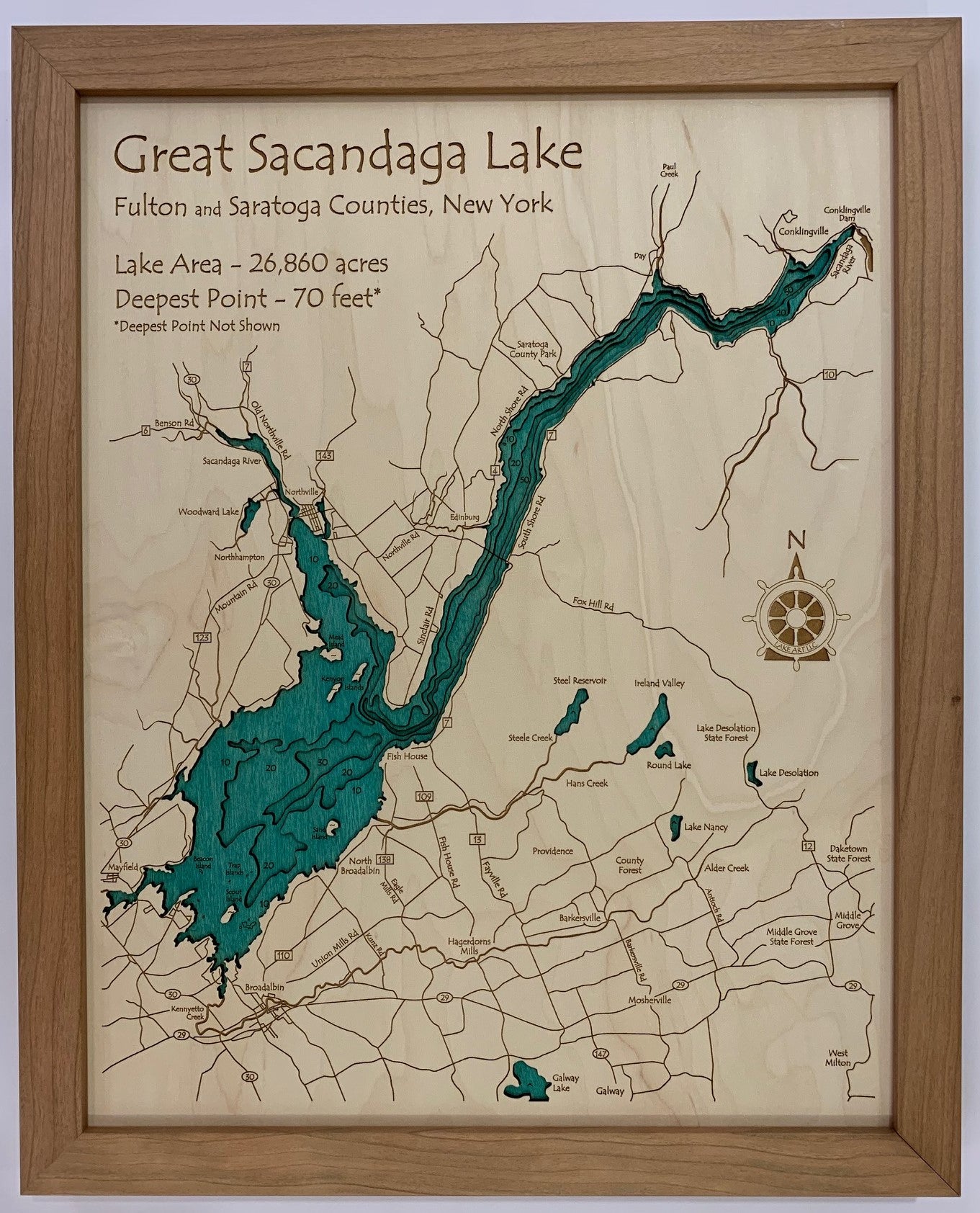 The Lake Art Lake Map - Great Sacandaga Lake is a 14 x 18 laser carved wooden relief map of this New York lake, showing its shape, nearby towns, roads, compass rose, and statsβa unique gift for lake lovers.