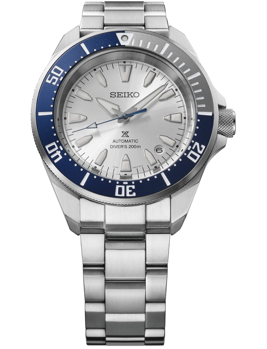 The Seiko Watch - 145th Anniversary Limited Edition (HBB001) is a silver automatic diver’s watch featuring a blue and silver bezel, silver dial, stainless steel bracelet, large markers, bold hands, and "DIVERS 200m" on the face.