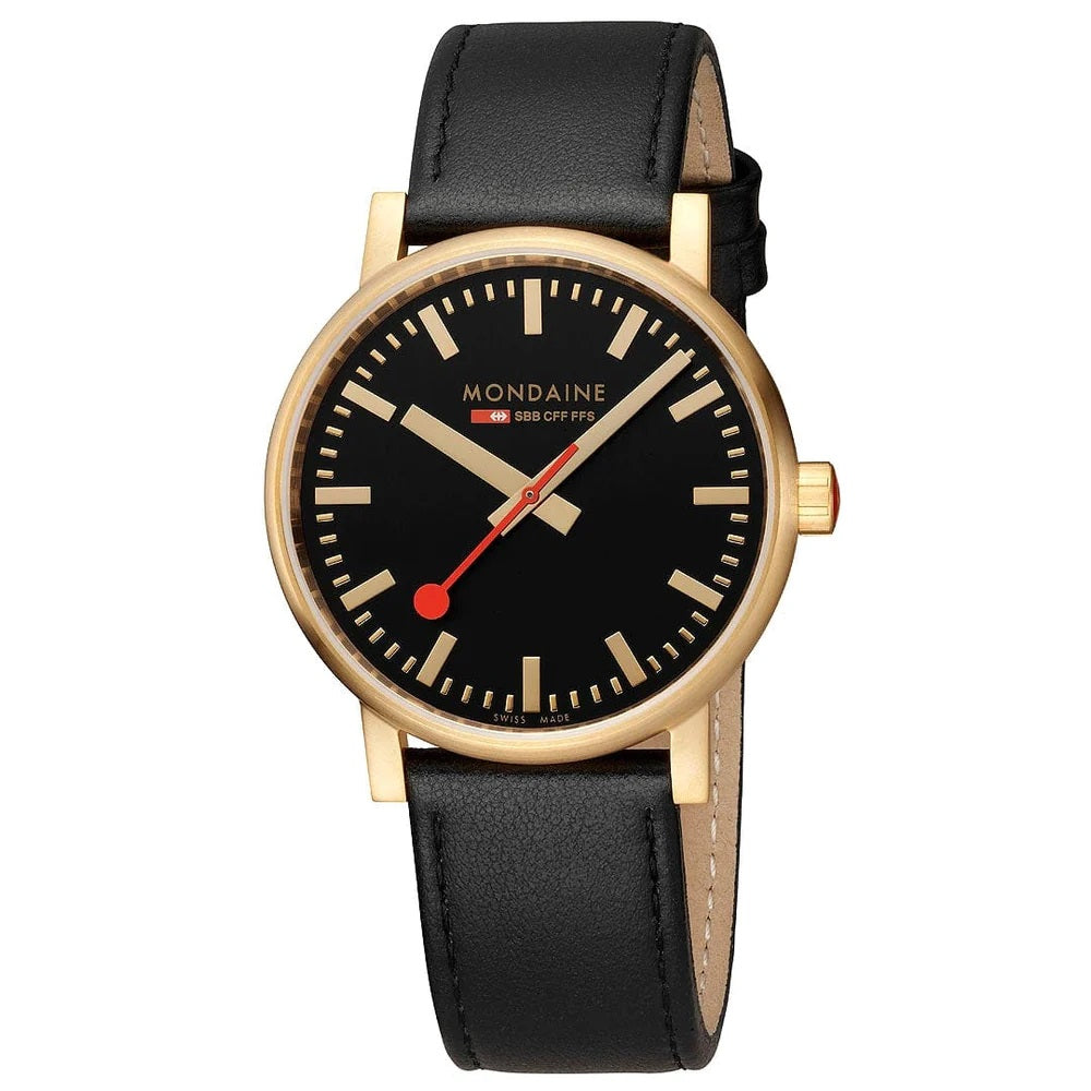 The Mondaine Watch - Evo2 - MSE.40122.LB features a black leather strap, black dial, gold-tone round case, minimalist markers, red seconds hand and crown, and the Mondaine logo beneath 12 o’clock. Swiss made.