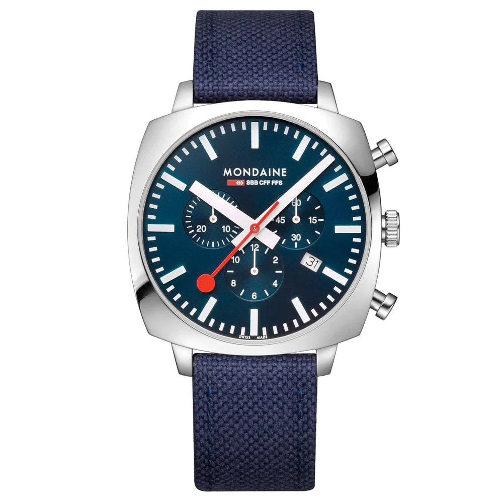 The Mondaine Watch - Grand Cushion - MSL.41440.LD is Swiss made with a square silver case, blue dial, white markers, red second hand, two subdials, date display, side pushers, and a blue textured recycled PET strap.