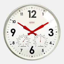 The Cloudnola Clock - Outdoor Zinc Decor (SKU0184) by Cloudnola is a round outdoor wall clock featuring black numbers, red hands, and two small dials for temperature and humidity—perfect for stylish outdoor décor. Time displayed: 10:10.