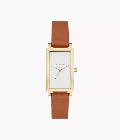The Fossil Skagen Watch - Ladies' Hagen Lille (SKW3097) features a rectangular gold-tone case, white dial with minimal markings, and brown leather strap, shown on a plain white background.