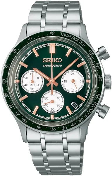 The Seiko Watch - Essentials Chronograph SSB481 features a green dial with three subdials, rose gold hands and markers, a tachymeter bezel, and a stainless steel silver bracelet.