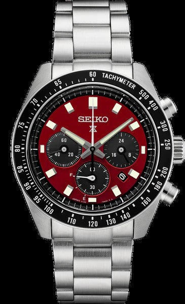 The Seiko Prospex Speedtimer Solar Chronograph SSC927, a U.S. Special Edition, features a stainless steel case, red dial with black subdials, tachymeter bezel, silver hour markers, three subdials, solar power, and date display.