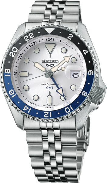 The Seiko 5 Sports GMT SSK033 features a stainless steel bracelet, white dial, date display, blue and black bezel, and shows 10:08 with the GMT hand at 22.