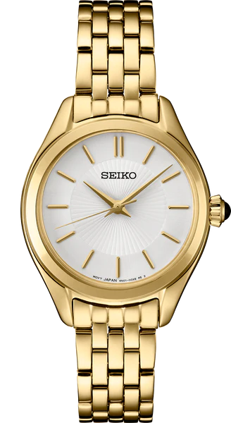 The Seiko Watch - Essentials - SUR538 is a gold stainless steel timepiece with a white dial, gold markers and hands, and a sleek link band. Designed by Seiko, it features an elegant look without numbers or extra dials.