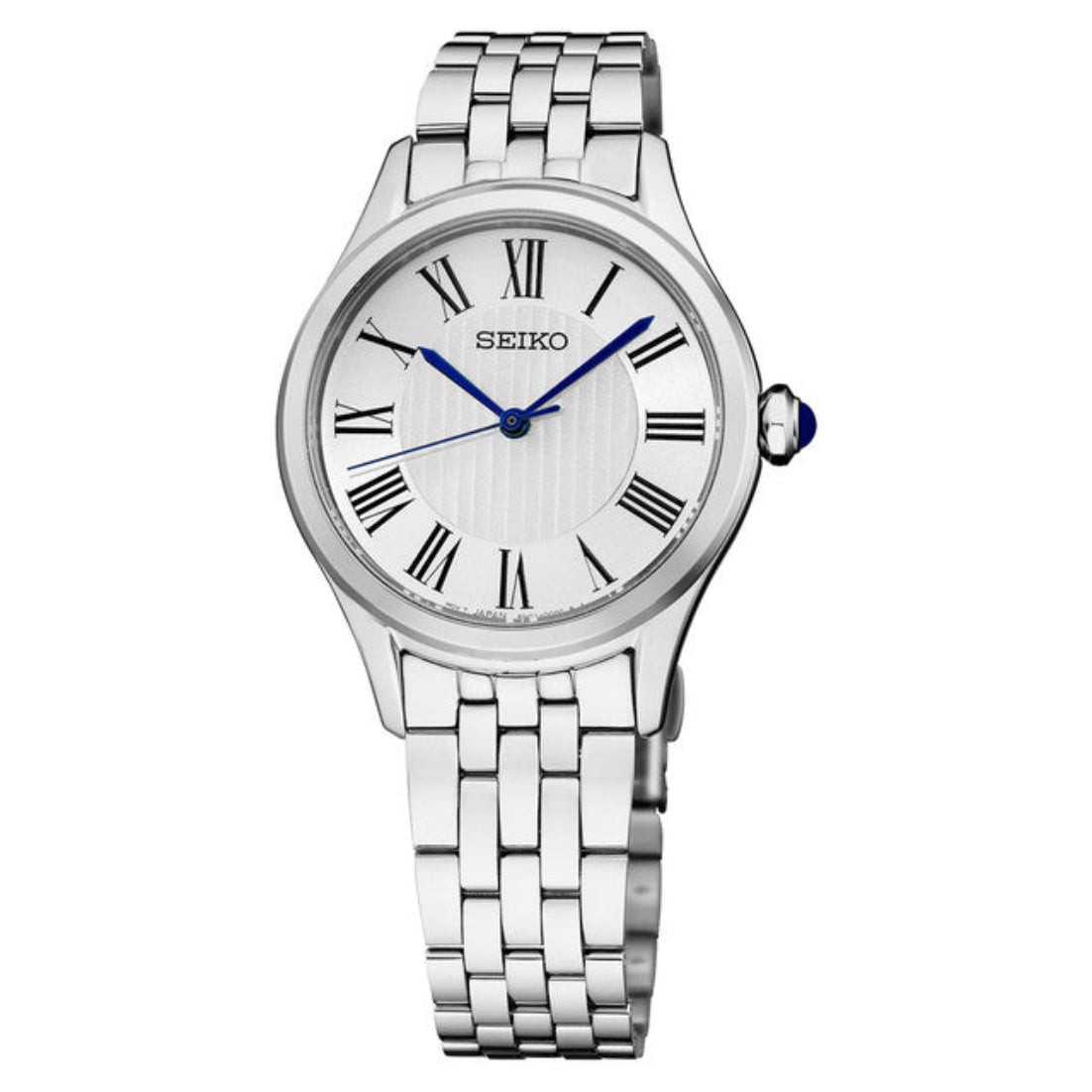 The Seiko Watch - Essentials - SUR609 is a silver ladies' watch with a stainless steel link band, white dial, black Roman numerals, and blue hands. It features a sapphire crystal and blue-accented crown for added elegance.