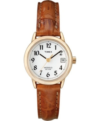 The Timex Watch - Easy Reader - T2J7619J features a brown leather strap, gold-tone case, white dial with black numerals, three gold hands, date window at 3 o'clock, and "INDIGLO WR 30M" on the dial. Brand: Timex.