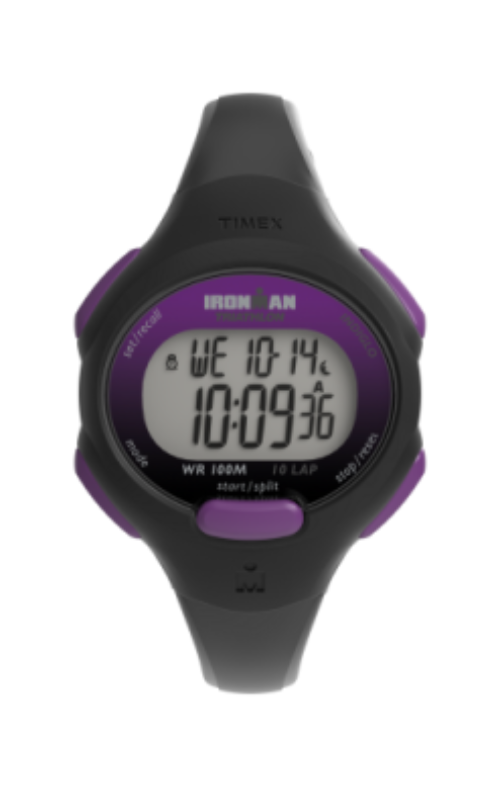 The Timex Ladies' Ironman Essential T5K5239J watch features a black and purple design with a durable resin strap, showing the time 10:09:36 and date WE 10-14 on its display.