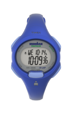 The Timex Watch - Ironman Essential - T5K7849J by Timex displays date, day, and time with large numbers and a lap counter. Its screen shows WE 10.14 and 10:09:36, highlighting this digital wristwatch’s practical design.