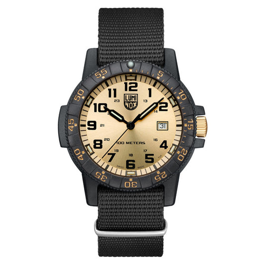The Luminox Leatherback Sea Turtle Giant XS.ZC25.GP features a tan dial with black numerals, a black bezel, and a black fabric strap. This Swiss Quartz watch has date display at 3 oclock and is water-resistant up to 100 meters.