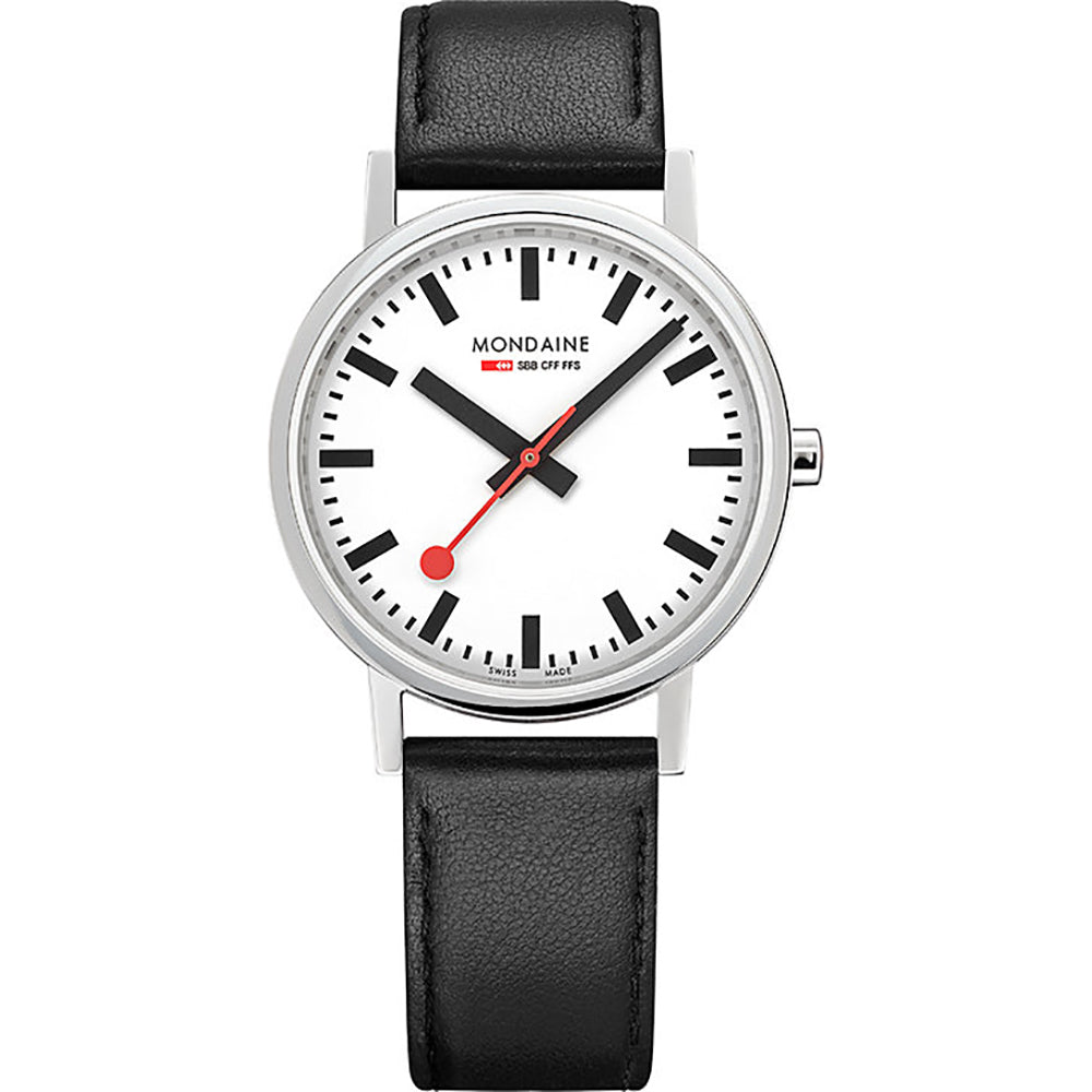 The Mondaine Watch - Classic Vegan Grape Leather (A660.30314.11SBV) features a white face, black markers and hands, red seconds hand, vegan grape leather band, with the brand logo and Swiss flag below 12—a Swiss design icon.