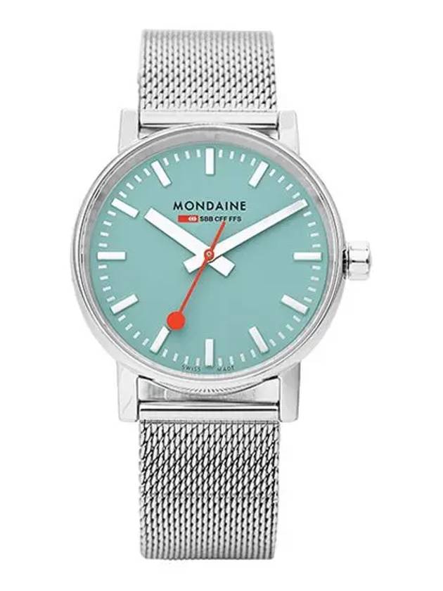 The Mondaine Watch - Evo2 - MSE.35140.SM features a silver mesh band, light dusk blue face, white markers, silver hands, red second hand, and the Mondaine logo—reflecting the iconic Swiss Railways Evo2 design.