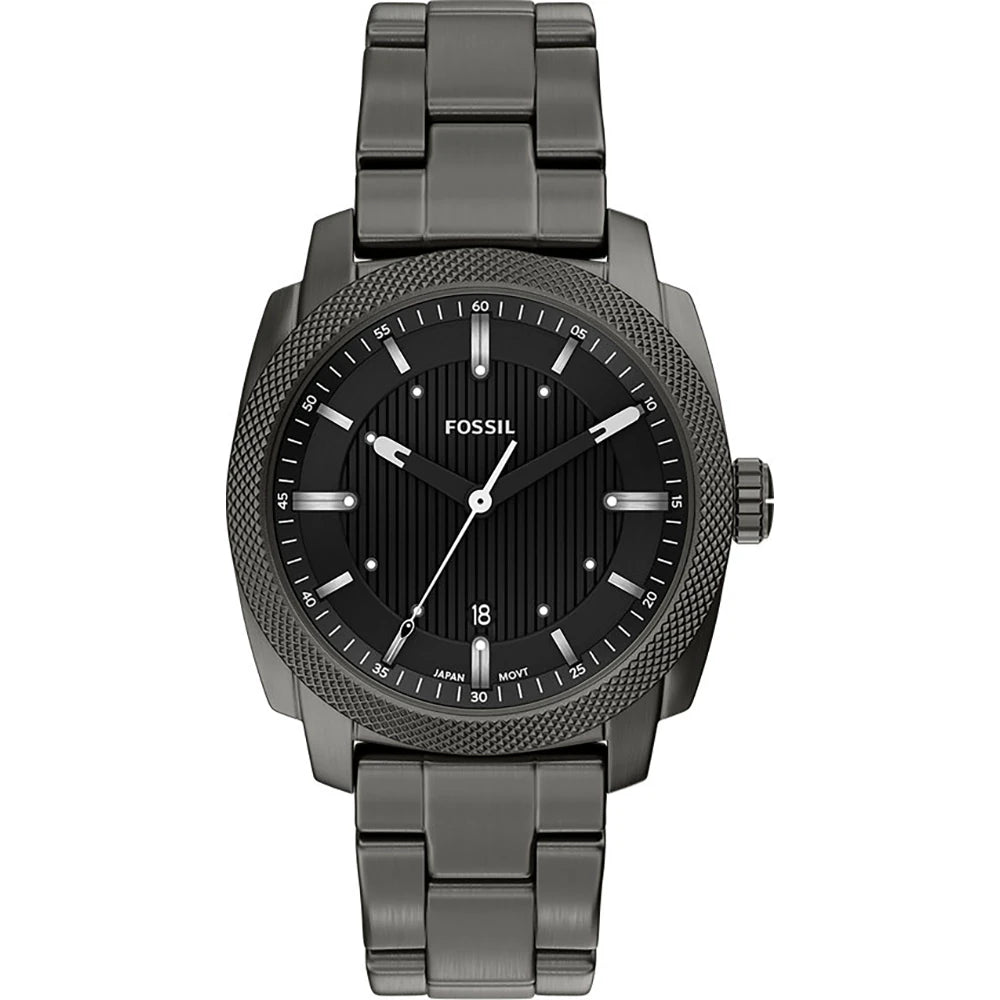A Fossil Machine men’s watch (FS6185) in black stainless steel, featuring a round black dial with silver hour markers, a date display at 6 o’clock, a textured bezel, and a sleek metal link band for a sophisticated look.