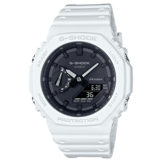 The Casio G-Shock Watch GA2100-7A by VLC Distribution Co. has a white design, black analog-digital display, labeled bezel buttons, and durable sporty style. The digital screen shows date and time.