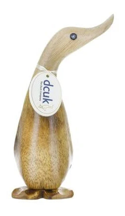 The Enesco DCUK Ducks - Natural Ducklings - 6017115 is a hand-carved bamboo ornament with a polished finish, dcuk tag, long beak, simple eyes, and carved webbed feet.