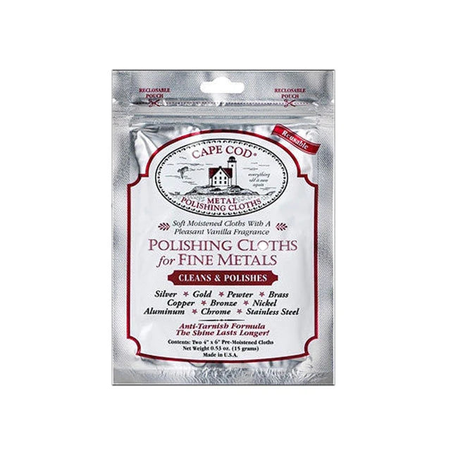 A silver and red Cape Cod Polishing Co package of Cape Cod Metal Polishing Cloth, designed to clean and polish fine metals like silver, gold, pewter, brass, copper, bronze, nickel, aluminum, chrome, and stainless steel.