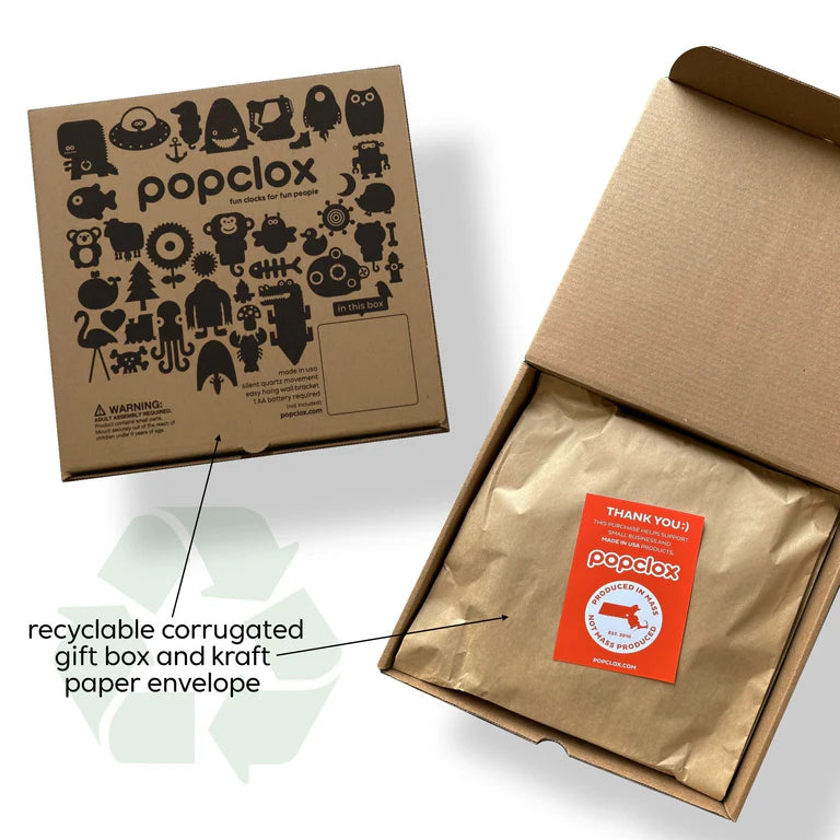 Two Popclox boxes: one closed with playful black illustrations and Popclox branding, the other open revealing a kraft envelope and thank you card. Recyclable packaging for your Popclox Outhouse Pendulum Clock (PCPEN131) with a green recycle icon visible.