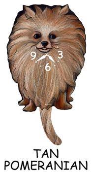 The Pink Cloud Pomeranian - Tan - Wagging Tail Dog Clock features a tan Pomeranian-shaped clock with the face and hands on its body. Its wagging tail acts as the pendulum, with "TAN POMERANIAN" displayed below.
