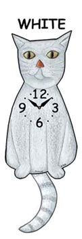 Illustration of a sitting white cat with a striped tail and orange nose, featuring a clock face showing 12:10 on its body and "WHITE" above its head. Product: White Cat - Wagging Tail Clocks by Pink Cloud.
