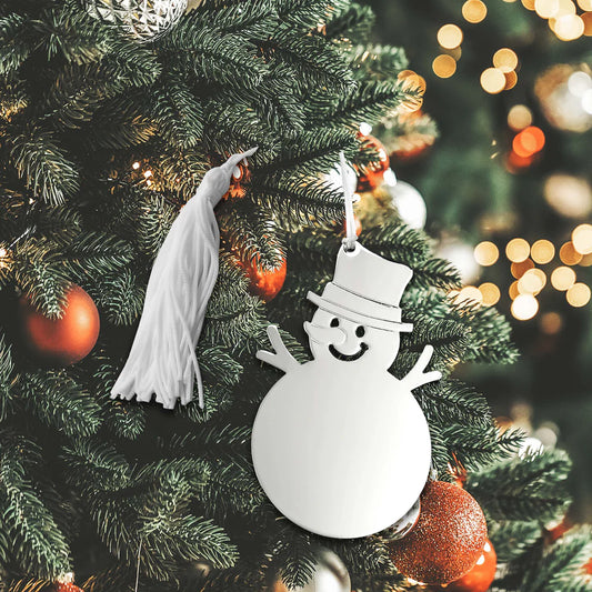 The Creative Gifts - Snowman - 19946 ornament from Creative Gifts features a shiny snowman with a top hat hanging on a festive Christmas tree, surrounded by glowing lights, red and gold baubles, and an elegant engraved ornament.